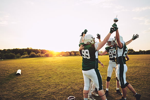 A football team celebrates a victory